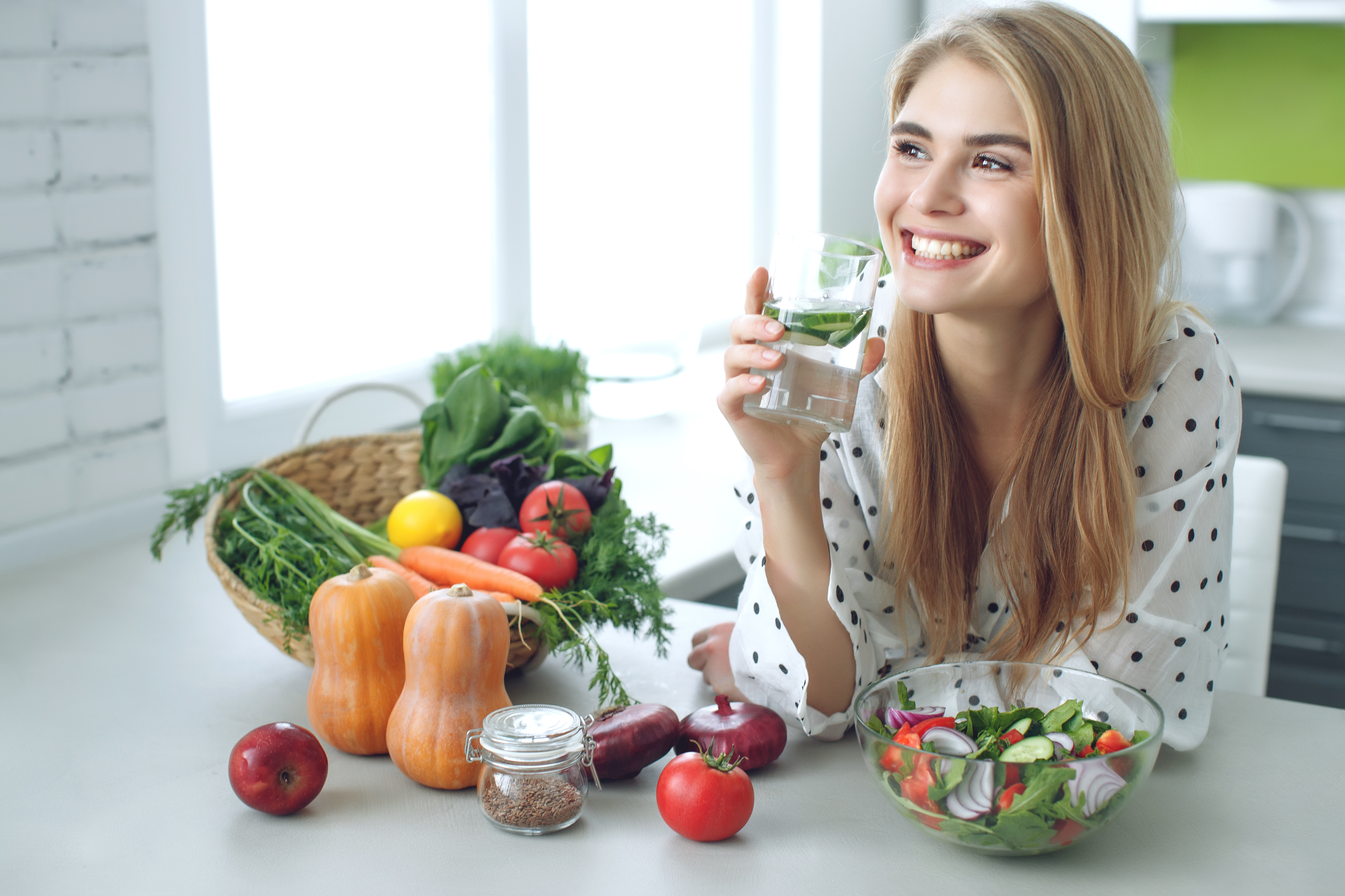 Fresh vegetables and meal planning ingredients on a kitchen counter